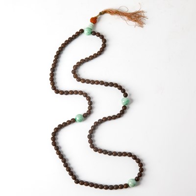 Lot 446 - A Chinese Wood and Jadeite Mala Necklace