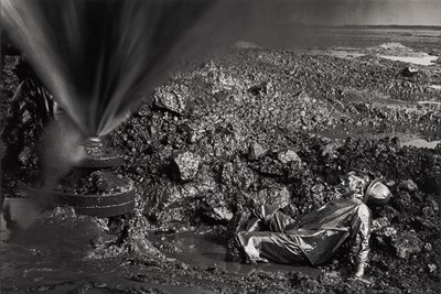 Lot 63 - Sebastiao Salgado, Fallen Worker, Kuwait Oil Fields, 1991
