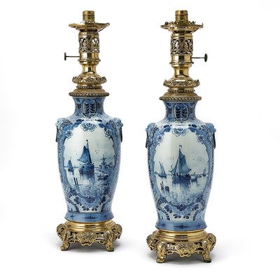 Lot 141 - Pair of Delft Style Gilt-Metal Mounted Blue and White Porcelain Table Lamps