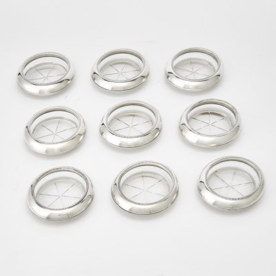 Lot 3279 - Set of Nine Frank M. Whiting & Co. Sterling Silver and Glass Coasters