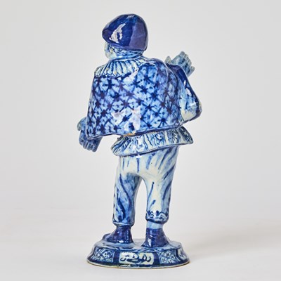 Lot 333 - Dutch Delft Blue and White Commedia Dell'Arte Figure