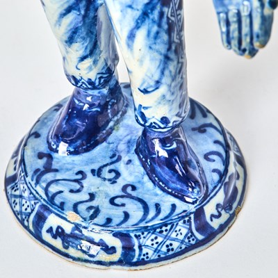 Lot 333 - Dutch Delft Blue and White Commedia Dell'Arte Figure