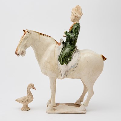 Lot 154 - A Chinese Sancai Glazed Pottery Equestrian Figure