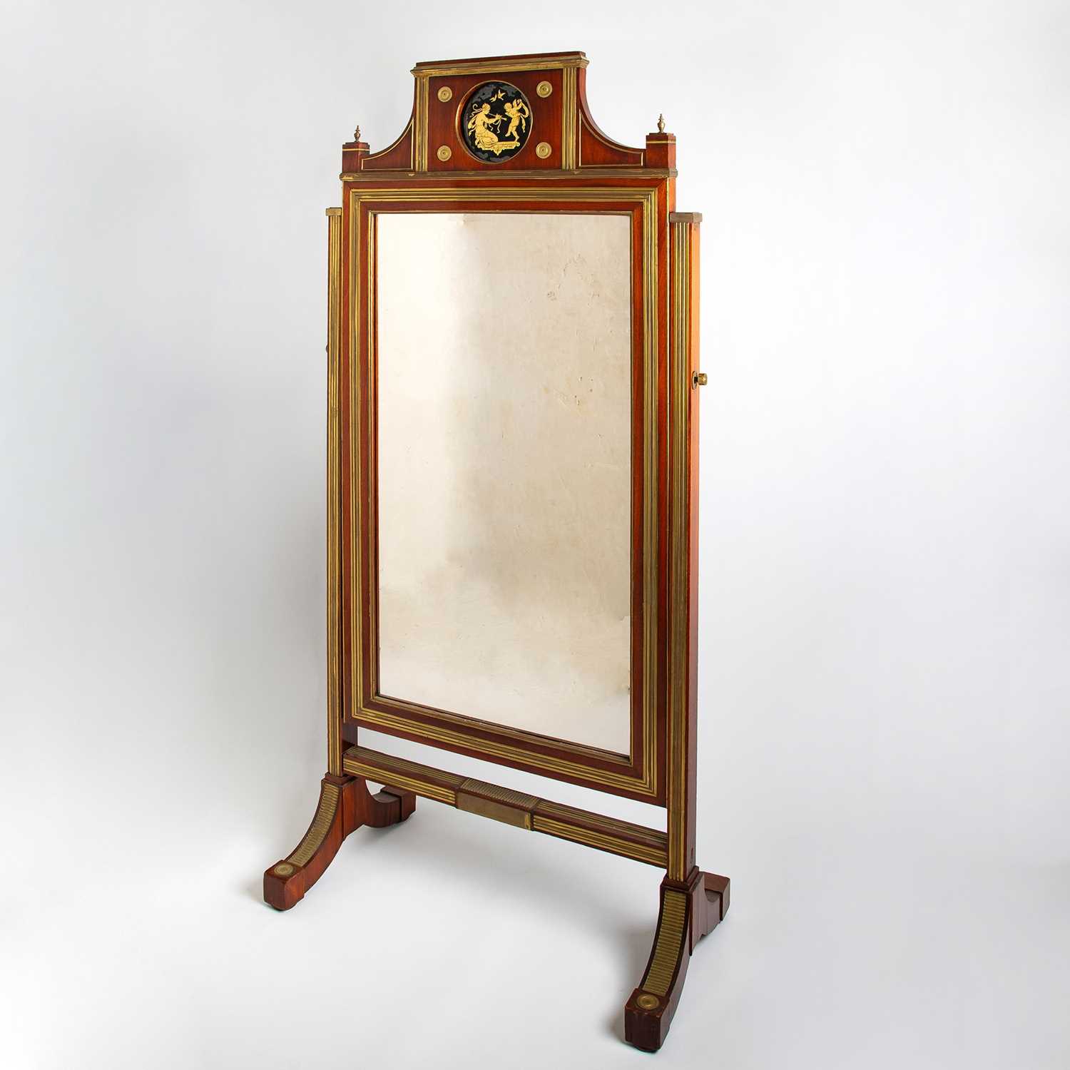 Lot 619 - Russian Imperial Brass-Inlaid Mahogany and Verre Églomisé Cheval Mirror
