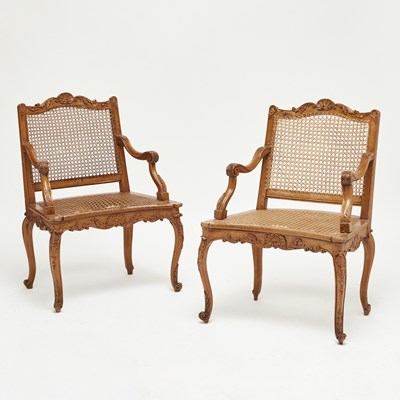 Lot 247 - Pair of Regence Style Caned Walnut Fauteuils