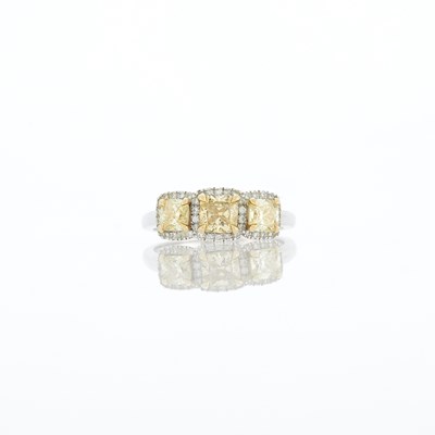 Lot 1160 - Two-Color Gold, Colored Diamond and Diamond Ring