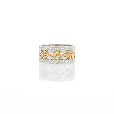 Lot 1087 - Platinum, Gold and Diamond Band Ring