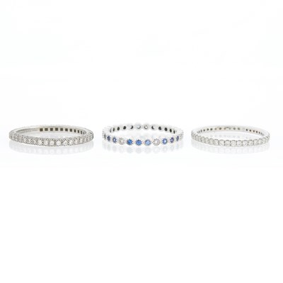 Lot 1276 - Three White Gold, Platinum, Diamond and Sapphire Band Rings