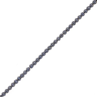Lot 1252 - Blackened Gold and Sapphire Bracelet with Diamond Star