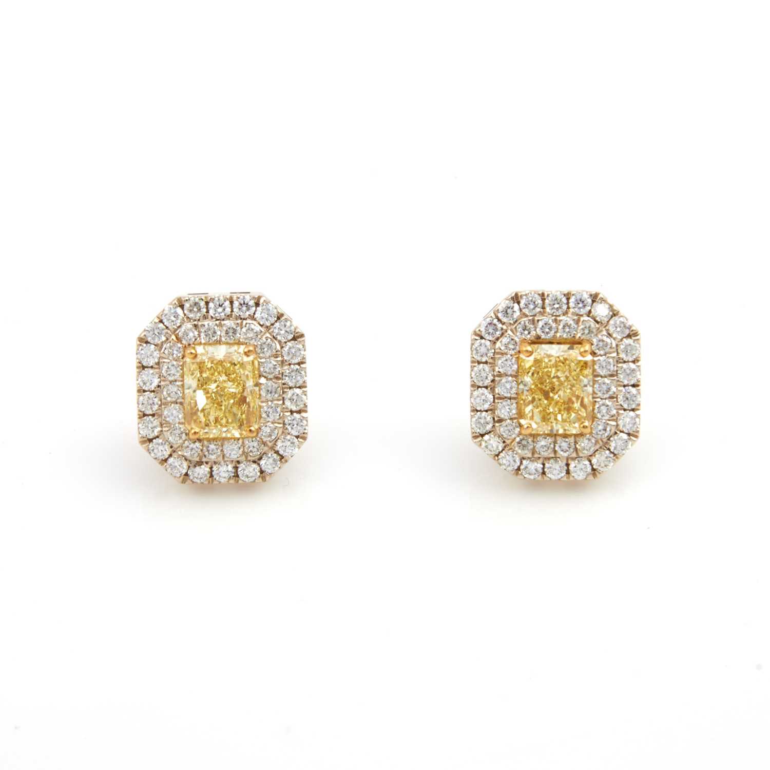 Lot 62 - Two Diamond Earrings, 82 diamonds, 2 stones about 5.00 cts., Natural Fancy Yellow, 80 stones about 2.25 cts., 14K 6 dwt. with GIA Report #62133