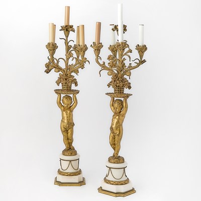 Lot 597 - Pair of Louis XVI Style Gilt-Bronze and White Marble Figural Five-Light Candelabra