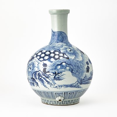Lot 328 - A Japanese Blue and White Porcelain Cistern