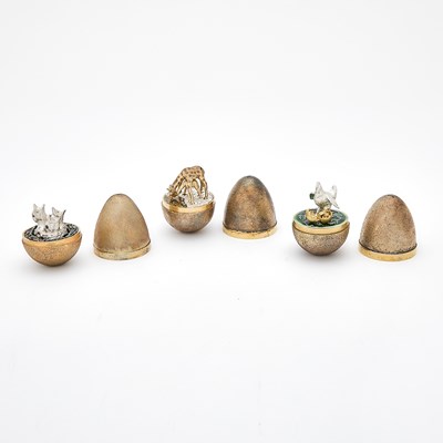Lot 302 - Three Stuart Devlin Sterling Silver Gilt Surprise Eggs