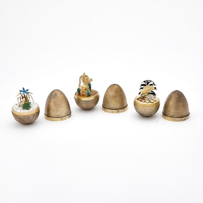 Lot 301 - Three Stuart Devlin Sterling Silver Gilt and Enamel Suprise Eggs