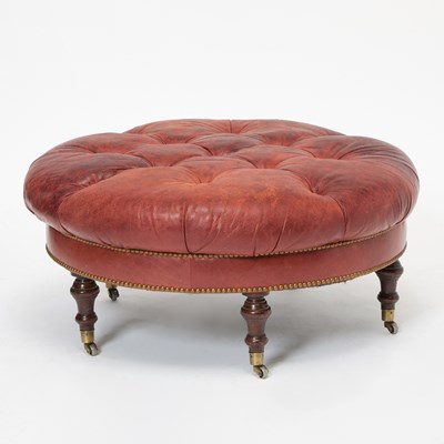 Lot 640 - Leather Tufted Mahogany Round Ottoman