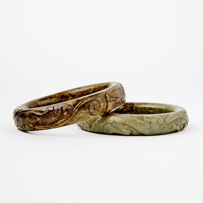 Lot 27 - A Group of Four Chinese Jade Bangles