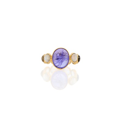 Lot 1187 - Gold, Cabochon Tanzanite, Moonstone and Diamond Ring