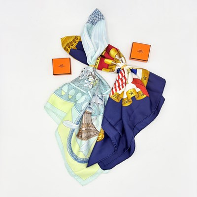 Lot 1245 - Two Hermes Scarves with Two Gold-Tone Scarf Rings