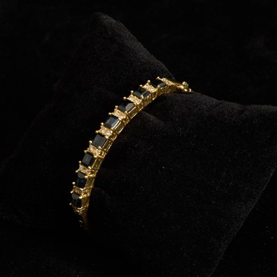 Lot 368 - Gold, Sapphire and Diamond Bangle Bracelet