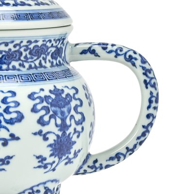 Lot 77 - A Chinese Blue And White Porcelain Kettle and Cover