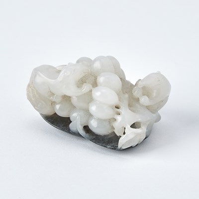 Lot 41 - A Chinese White and Grey Jade 'Squirrel and Grapes' Group