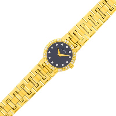 Lot 114 - Piaget Gold, Black Onyx and Diamond 'Dancer' Wristwatch
