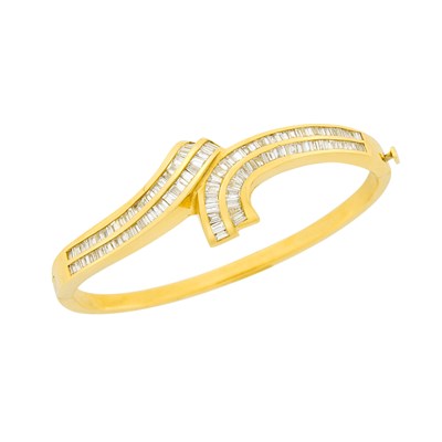 Lot 101 - Gold and Diamond Crossover Bangle Bracelet