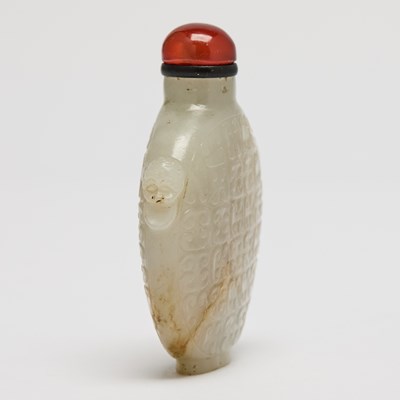 Lot 9 - A Chinese Carved Jade Snuff Bottle