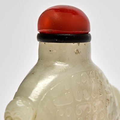 Lot 9 - A Chinese Carved Jade Snuff Bottle