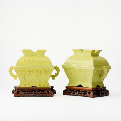 Lot 75 - A Pair of Chinese Yellow Glazed Porcelain Archaistic Vessels and Covers