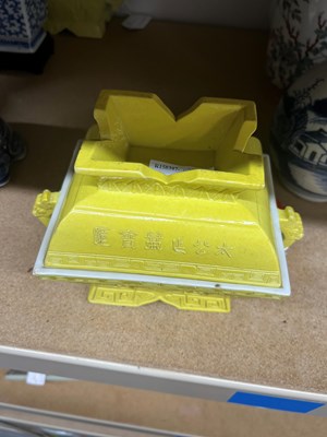 Lot 75 - A Pair of Chinese Yellow Glazed Porcelain Archaistic Vessels and Covers