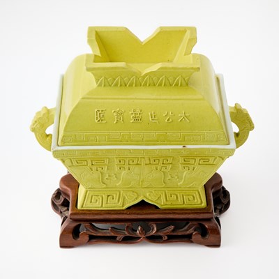 Lot 75 - A Pair of Chinese Yellow Glazed Porcelain Archaistic Vessels and Covers