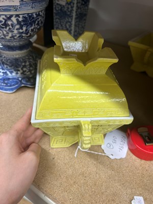 Lot 75 - A Pair of Chinese Yellow Glazed Porcelain Archaistic Vessels and Covers