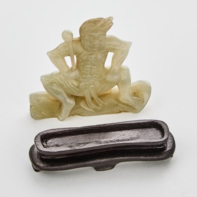 Lot 22 - A Chinese Celadon Jade Figural Carving of Vajrapani