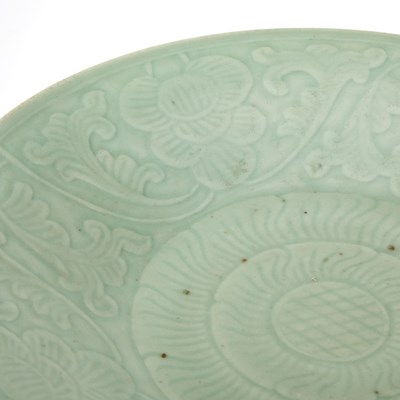 Lot 95 - A Chinese Celadon Glazed Carved Porcelain Charger