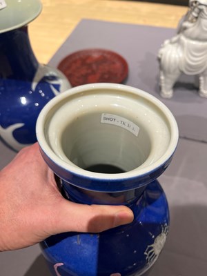 Lot 76 - A Chinese Blue Ground Enameled Porcelain 'Fishes' Rouleau Vase