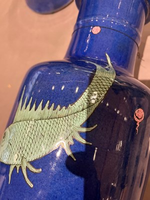Lot 76 - A Chinese Blue Ground Enameled Porcelain 'Fishes' Rouleau Vase