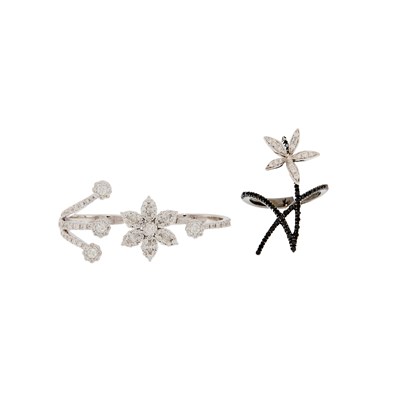 Lot 2096 - White Gold and Diamond Two-Finger Flower Ring and Two-Color Gold and Diamond Flower Ring