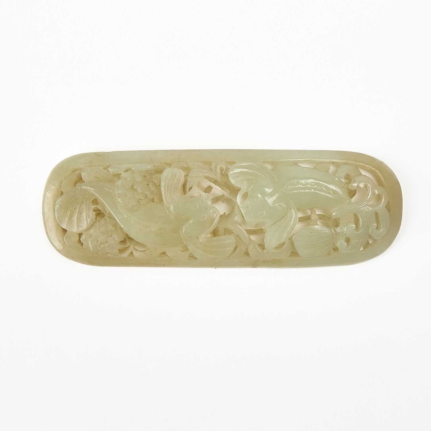 Lot 19 - A Chinese Celadon Jade Reticulated Plaque