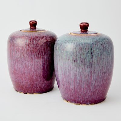 Lot 94 - A Pair of Chinese Flambe Glazed Porcelain Jars and Covers