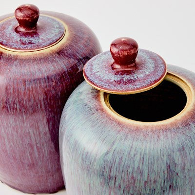 Lot 94 - A Pair of Chinese Flambe Glazed Porcelain Jars and Covers
