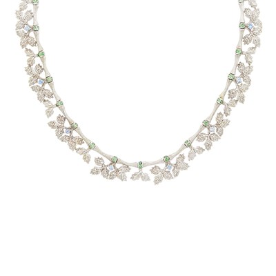 Lot 113 - White Gold, Diamond, Green Garnet and Sapphire Leaf Fringe Necklace