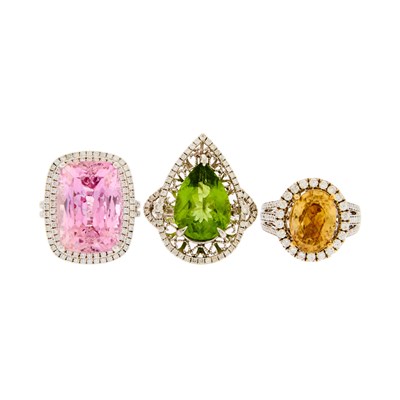 Lot 1144 - Three White Gold Peridot, Brown Zircon, Kunzite and Diamond Rings