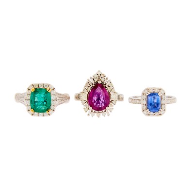 Lot 1137 - Three White Gold, Platinum, Pink and Blue Sapphire, Emerald and Diamond Rings