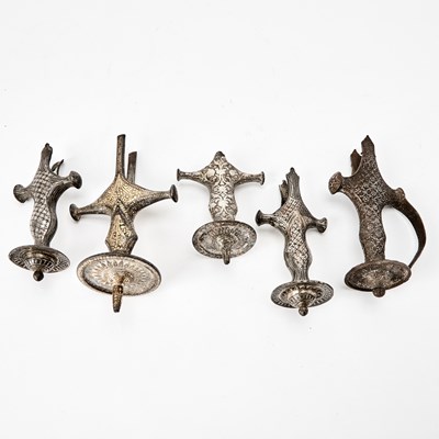 Lot 332 - Five Indian Silver and Brass-Inlaid Alloy Bidri Ware Talwar Handles