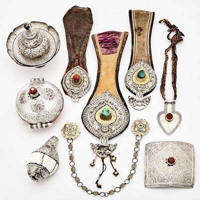 Lot 303 - A Group of Tibetan Silver and Mixed Metal Ritual Objects