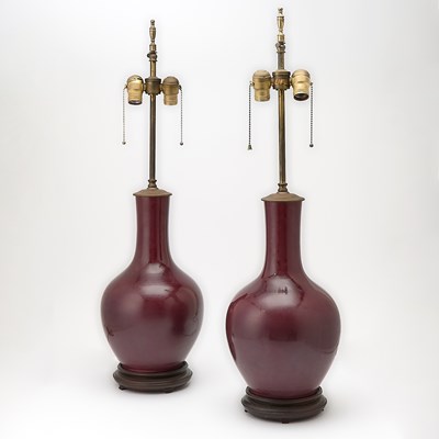 Lot 100 - A Pair of Chinese Red Glazed Porcelain Vases