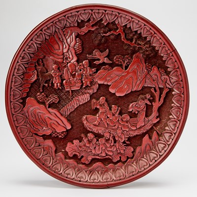 Lot 39 - A Chinese Carved Cinnabar Lacquer 'Eight Immortals' Dish
