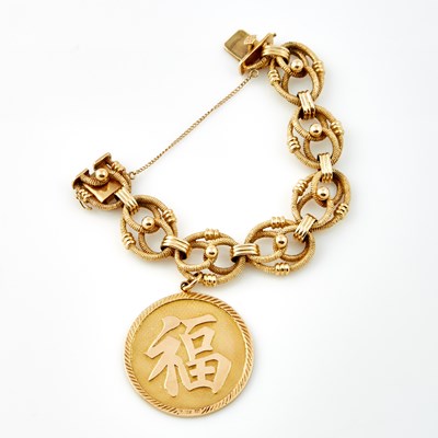 Lot 197 - Gold Charm Bracelet with charm attached, 14K 52 dwt.