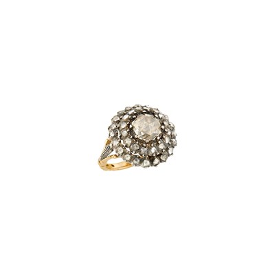 Lot 1070 - Silver, Gold and Diamond Ring